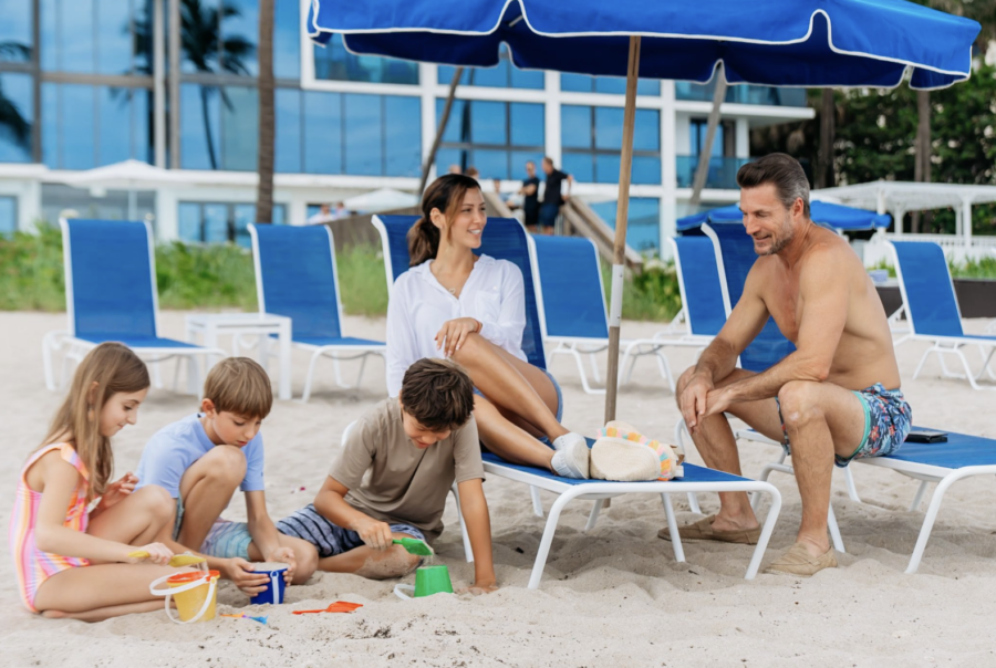 family on private beach in palm beach